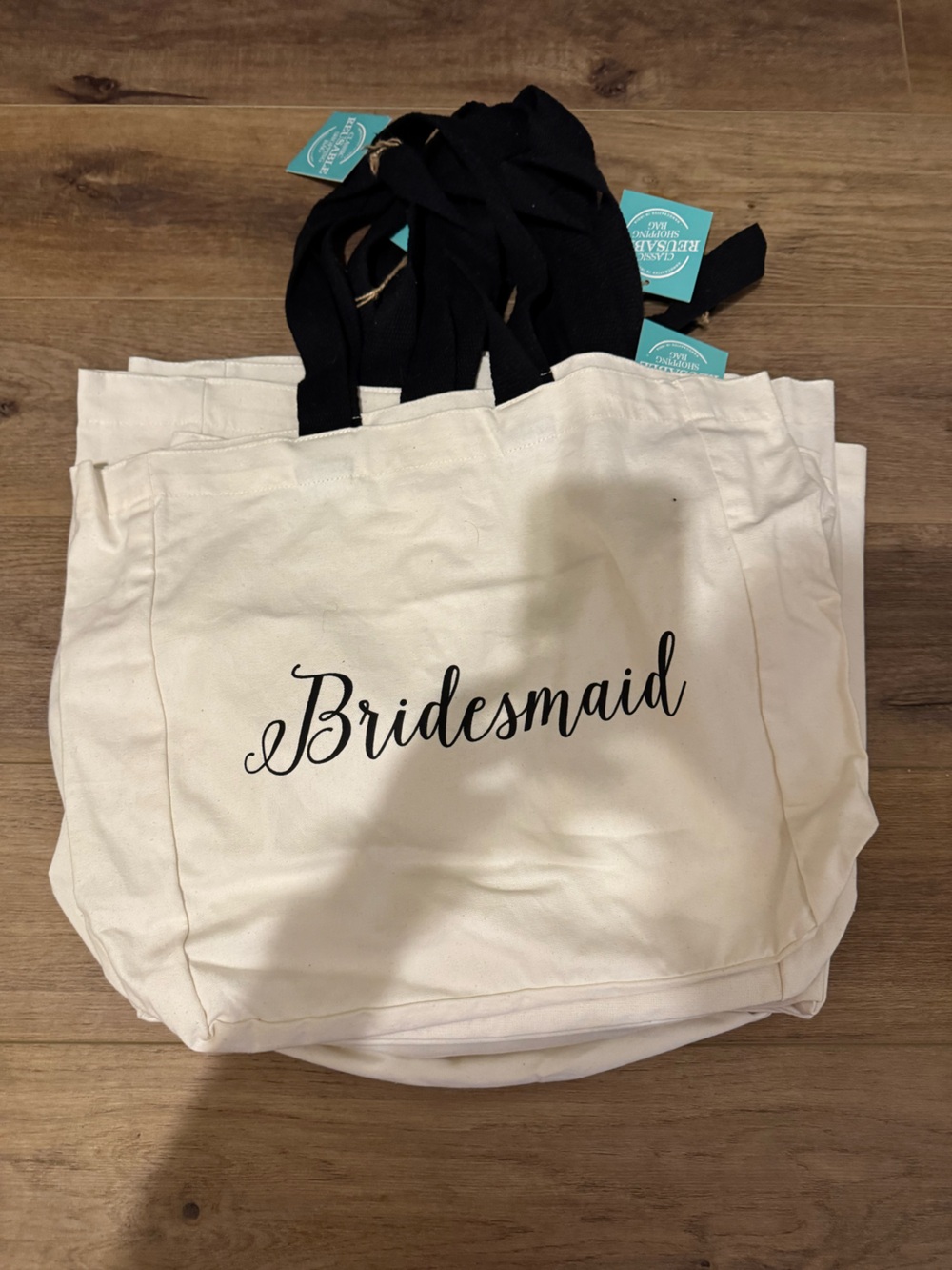 6 tote bags that say Bridesmaid on both sides of bag